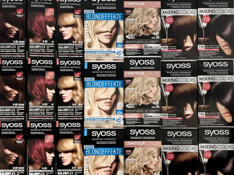 Dicht gestapelte Haarfarben-Kartons der Marke Syoss (Coloration, Blondeffekte, Mixing Colors) – Kosmetik-Restposten im Liquidato-Lager